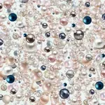 Optična iluzija: Lahko v 20 sekundah opazite diamant med biseri?