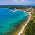 Hrvaški otok z najlepšimi plažami, ki ga gotovo še ne poznate (in tako blizu je)