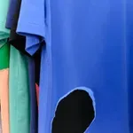 Slovenec na tednu mode v Parizu: novo kolekcijo Comme des Garçons krasijo kolaži Nejca Praha