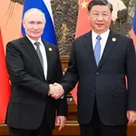Krepitev sodelovanja: Xi se je v Pekingu sestal s Putinom
