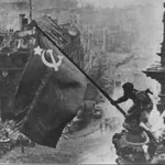 Puškov sporočil Merzu: Naj v pisarni izobesi fotografijo zastave Rdeče armade nad Reichstagom