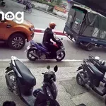 Zaboji piva padajo s tovornjaka na prometni ulici