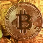 Биткойнът изтри за ден 300 млрд. долара от капитализацията си