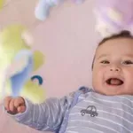 С какви занимания е изпълнен денят на тримесечното бебе