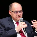 Schmidt says he faced “enormous pressure” from U.S. before stepping down
