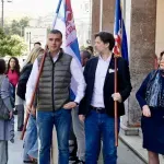 Opposition walks out of Belgrade city assembly session, marches 20 km