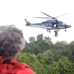 Velika iskalna akcija na Mangartu: Avstrijca iščejo tudi s helikopterjem