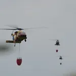 4 helikoptera i vatrogasci iz EU stigli u Srbiju, pomažu u gašenju požara